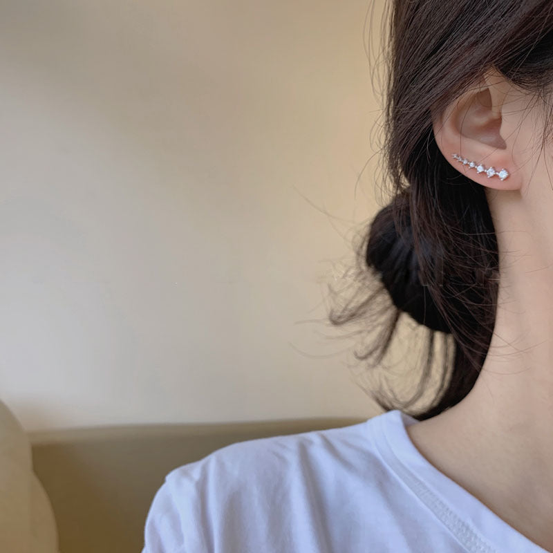 Modestique London | Elegant Seven-Star Diamond Stud Earrings
