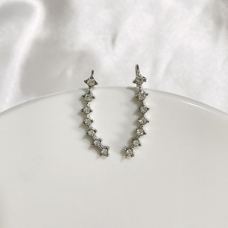 Modestique London | Elegant Seven-Star Diamond Stud Earrings