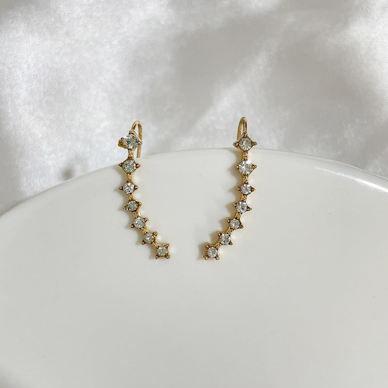 Modestique London | Elegant Seven-Star Diamond Stud Earrings