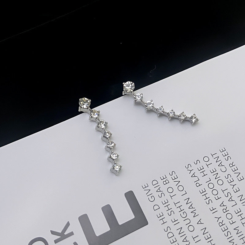 Modestique London | Elegant Seven-Star Diamond Stud Earrings